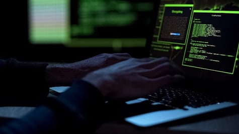 Cybercriminal using computer