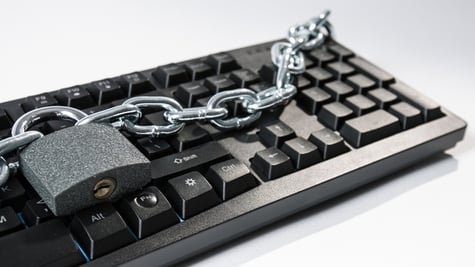 Keyboard wrapped in chain with locker
