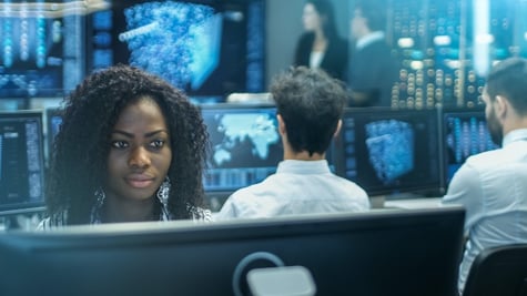 Female Computer Engineer Works on a Neural Network