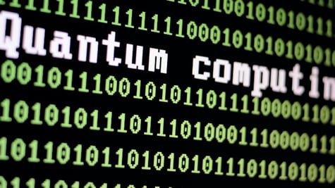 Computer screen with quantum computing logo with a binary computer code background illustration