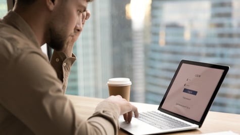 Young man preparing to input personal details on website login page