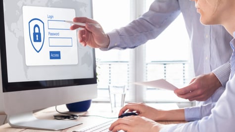 Cyber security concept with manager providing authentication credentials (login, password) to employ