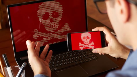 16-bit skull taking picture from mobile phone