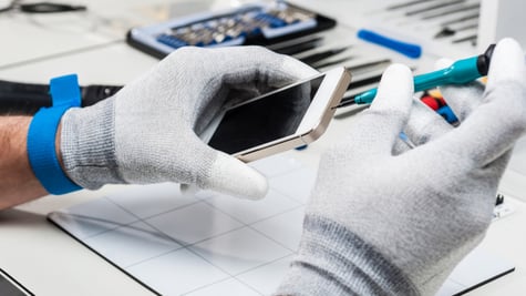 Close-up photos showing process of mobile phone repair