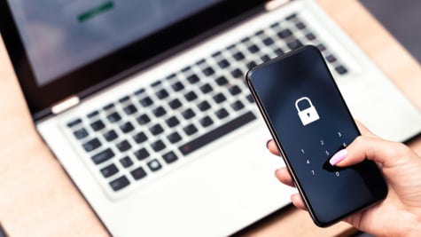 Entering login verification passcode on mobile. 2fa concept.