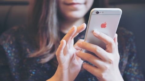 woman holding iphone