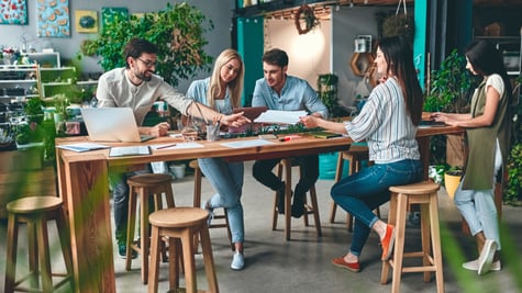 Group of young business people are working together in modern office