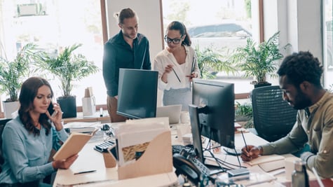 Group of young people working in an office