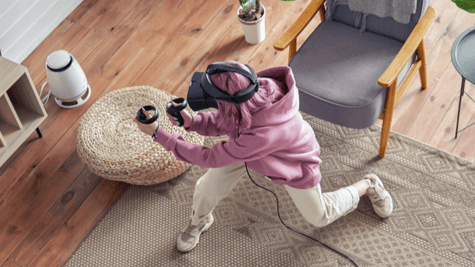 woman playing with VR glasses