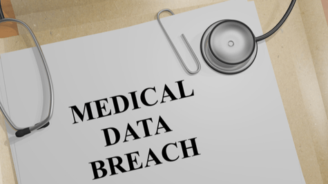 Medical data breach written on document with doctor's tools