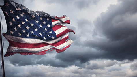 Symbolic depiction of ragged US flag to show country taking a pounding from cyber attacks