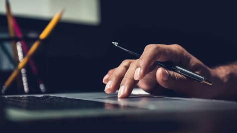 Hand using laptop mouse