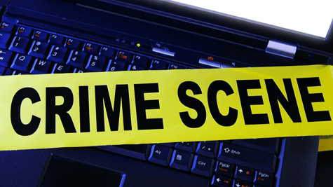 Crime scene sign on a computer