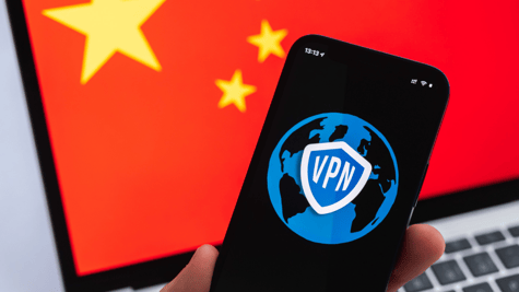 Concept photo of VPN protected mobile with Chinese flag on computer screen