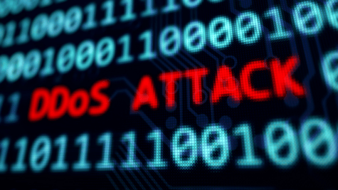 Screen with binary code and DDos written on it