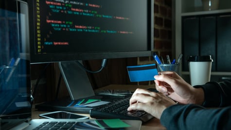 hacker in front of a computer