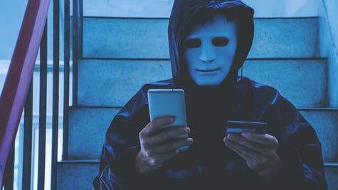 Cybercriminal with a mask