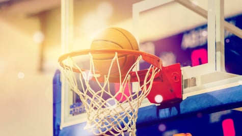 Orange basketball in the hoop
