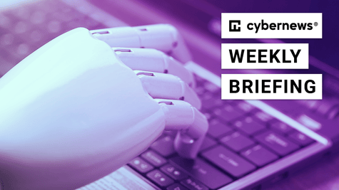Robotic hand on a keyboard