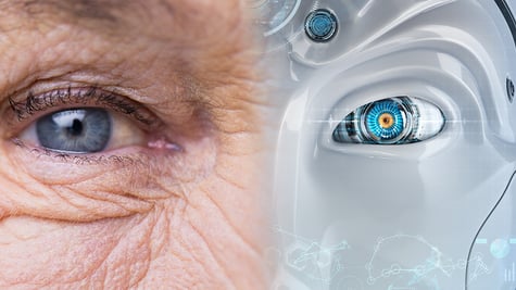 an eye of an elderly person and an eye of a robot