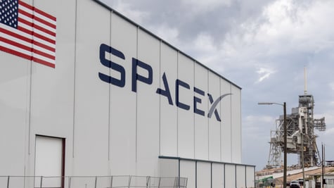 Space X building w logo and American Flag
