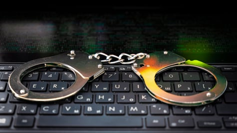 Handcuffs on keyboard