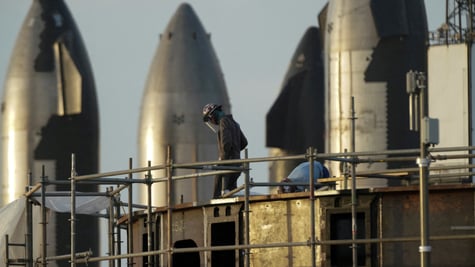 SpaceX workers, rockets