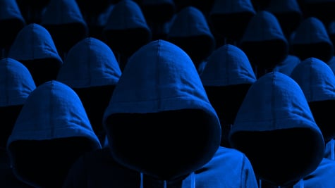 Lots of faceless hackers in hoodies