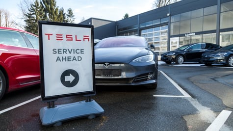 Tesla dealer repair