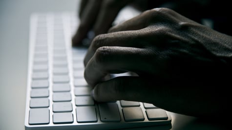 phishing-type-fingers