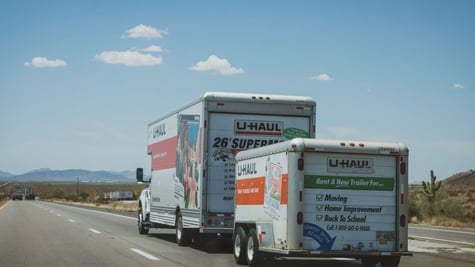 U-Haul tow truck on the road