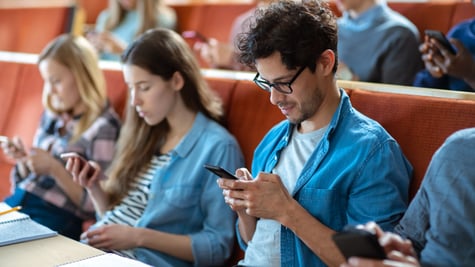 student with phone