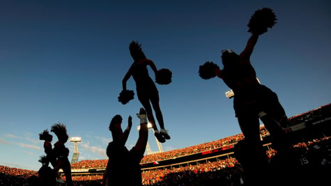Cheerleading squad performs during a game.