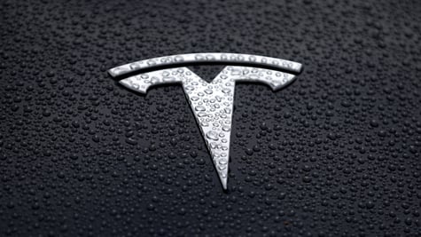 tesla-logo-rain