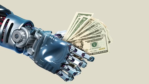 robotic hand holding dollars