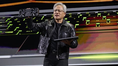 Jensen Huang holding GeForce RTX 50 at CES 2025