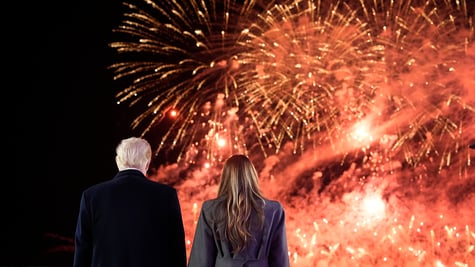 Donald Trump and Melania Trump watching fireworks