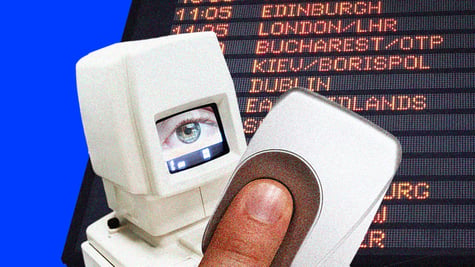 Iris and fingerprint scanners in front of a departures board at the airport.