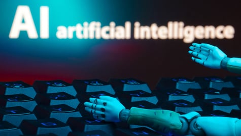 Robot hands on a keyboard