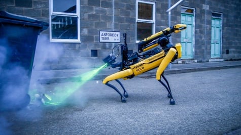 Boston Dynamics robot dog difusing a bomb