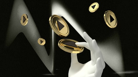 A robot holding gold YouTube coins.