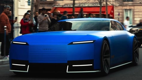 Jaguar Type 00 electric car concept on road in Paris