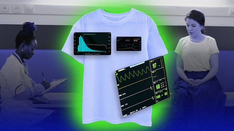 A doctor monitoring a patient's health data from a wearable tshirt device.