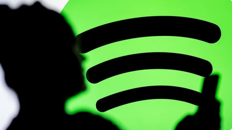 Spotify logo person