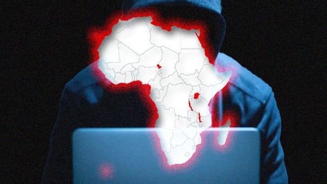 The map of Africa emblazoned on the face of a hacker.