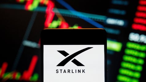 The Starlink logo on a colorful dashboard.