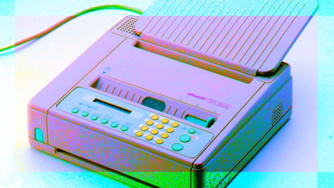 A pink retro fax machine.