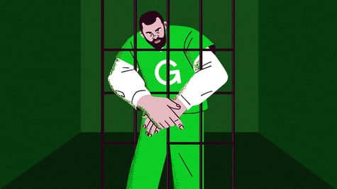 man behind jail bars in white shirt and green throusers and top