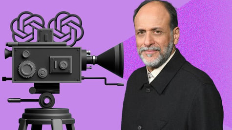 Guadagnino in front of the camera with a pink background