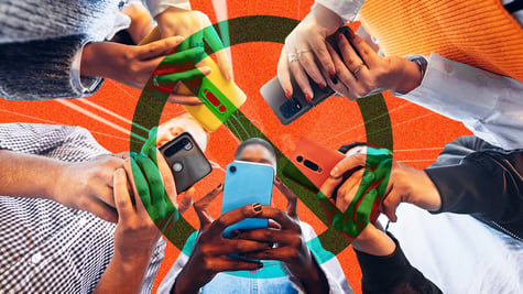 A circle of teens on their smartphones.